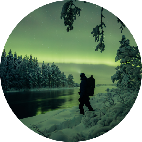 Revontulet (pyöreä ikoni). Kuva Mikko Santasalo